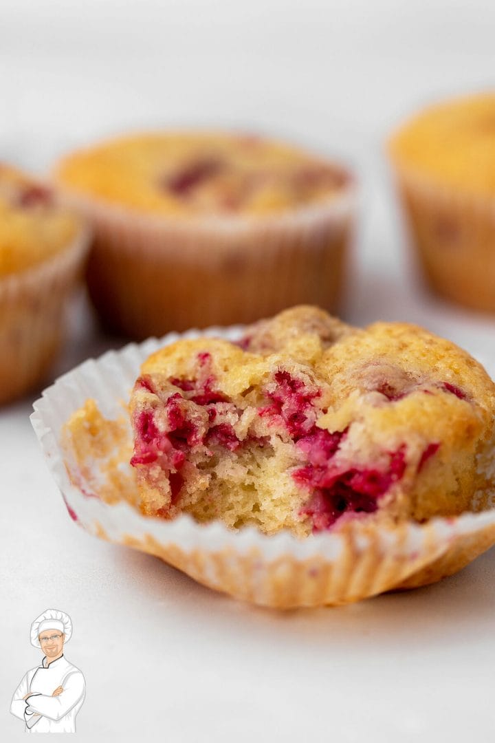 Soft, moist homemade raspberry muffin made with our easy recipe.