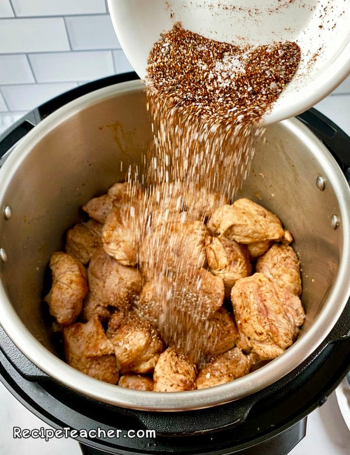 Seasoning meat for Instant Pot carnitas recipe