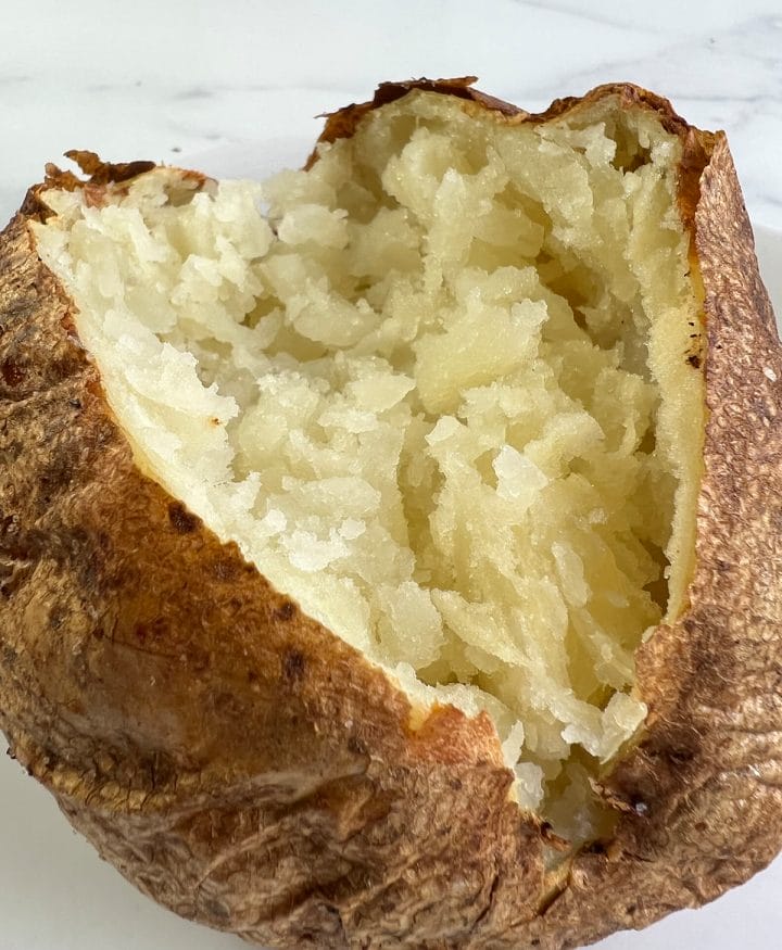 https://evuecezehrh.exactdn.com/wp-content/uploads/2021/10/best-damn-air-fryer-baked-potatoes6.jpg?strip=all&lossy=1&resize=720%2C875&ssl=1