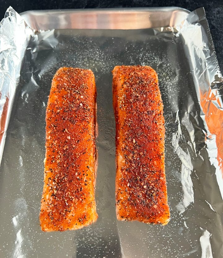Seasoned salmon filets ready to go in the oven.
