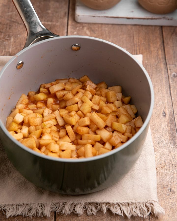 Apple pie filling in a sauce pan.