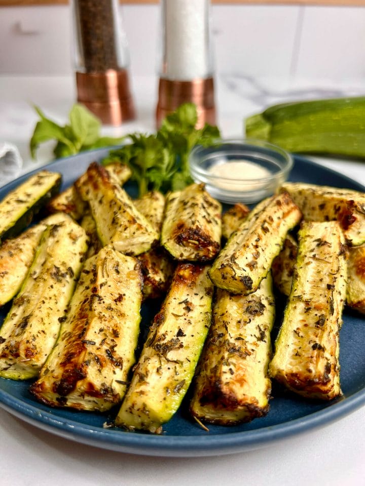 Roasted zucchini spears made in an air fryer.