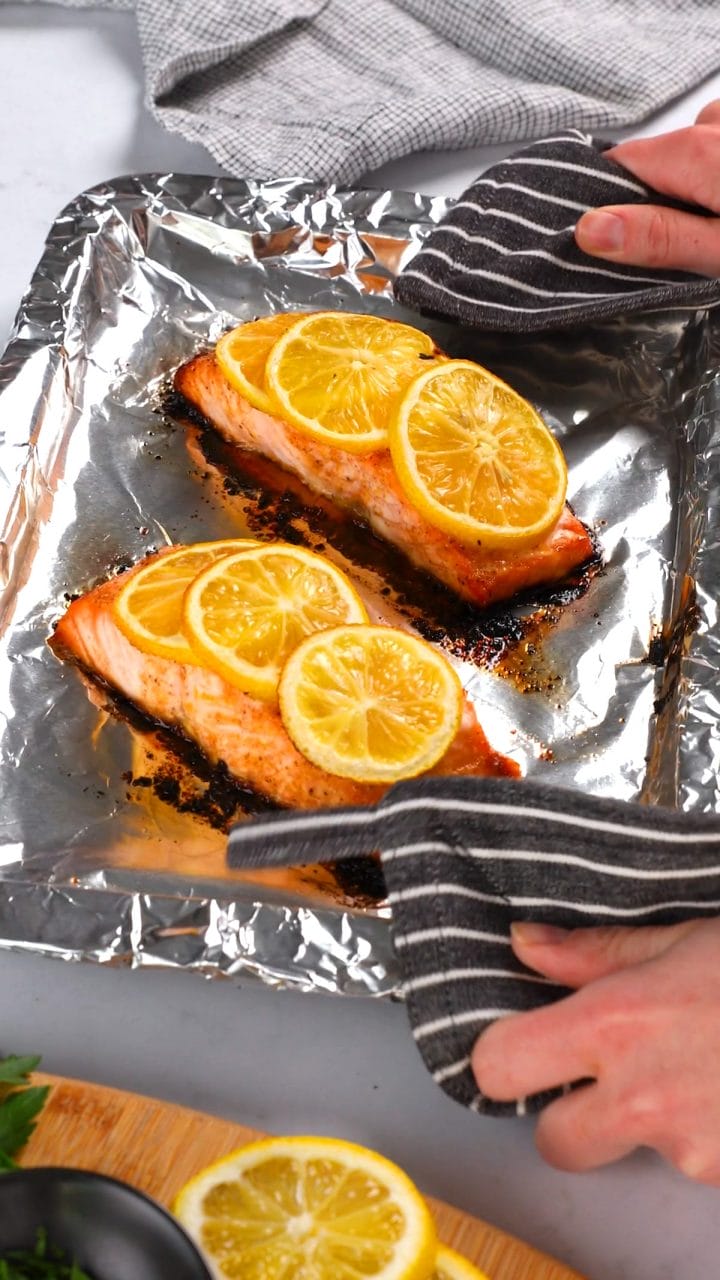 Taking our honey garlic salmon out of the oven.