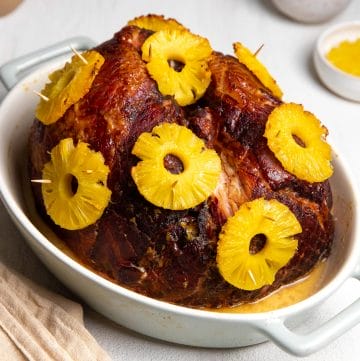 Delicious and easy recipe for baked ham with a maple and brown sugar glaze.