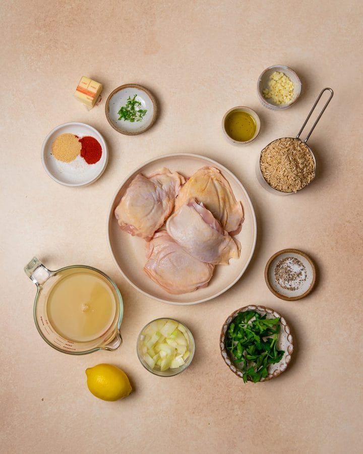 All the ingredients to make chicken thighs with brown rice.